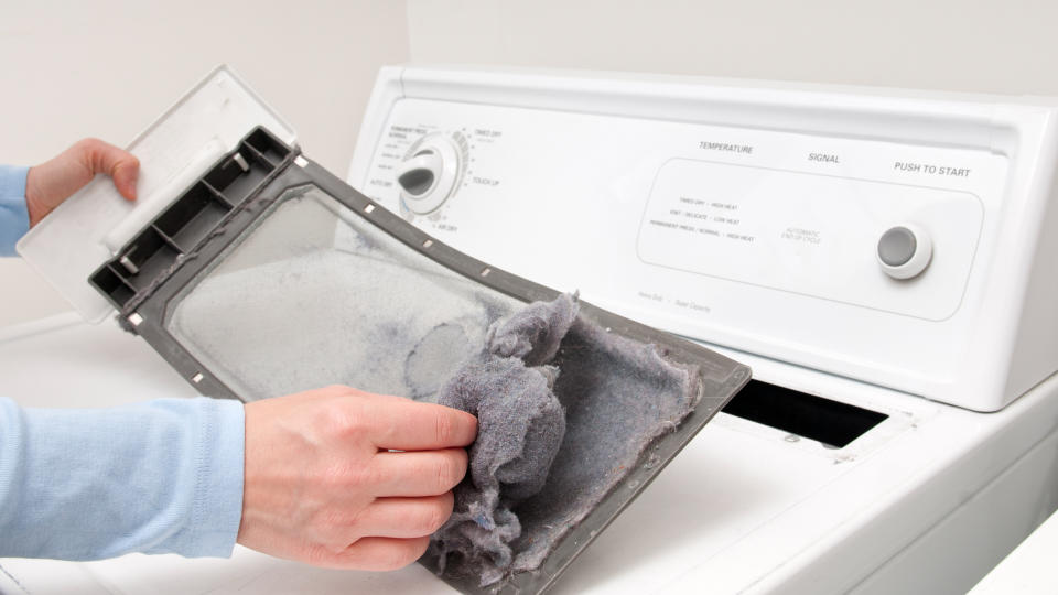 Cleaning the clothes dryer lint trap