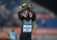 Apr 23, 2017; Nassau, Bahamas; Aaron Brown celebrates after running the anchor leg on the Canada 4 x 200 relay that won in 1:19.42 during the IAAF World Relays at Thomas A. Robinson Stadium. Mandatory Credit: Kirby Lee-USA TODAY Sports