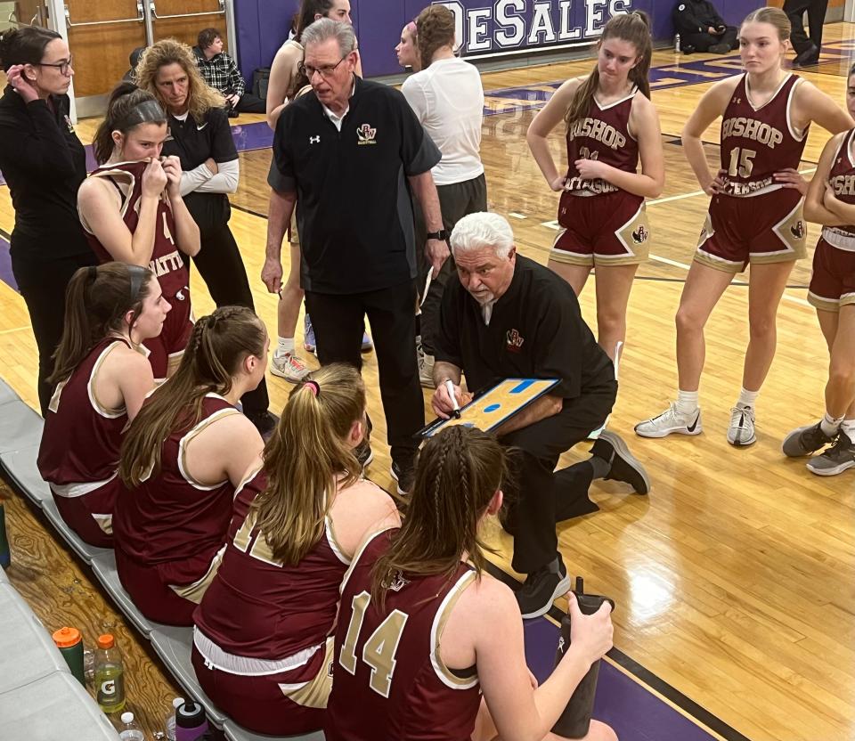 Watterson coach Sam Davis instructs his team during a 40-37 win at DeSales on Thursday.