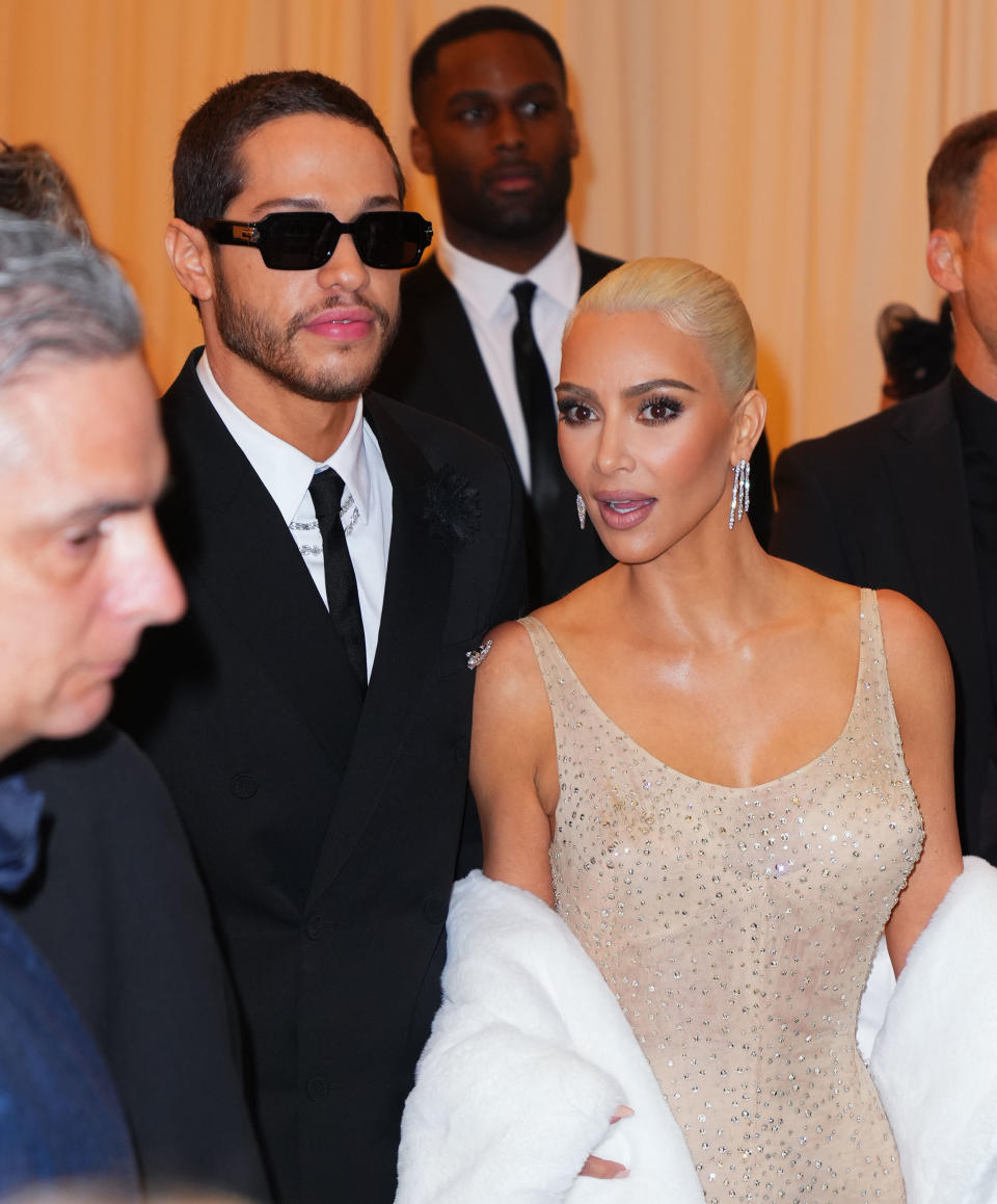 Pete Davidson, wearing sunglasses, and Kim Kardashian at the MET Gala