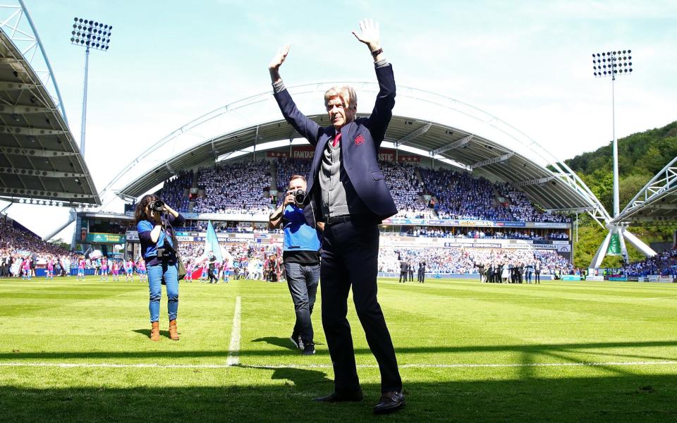 Farewell: Arsenal manager Arsene Wenger waves to the supporters ahead of the Premier League match between Huddersfield Town and Arsenal - Getty Images Europe