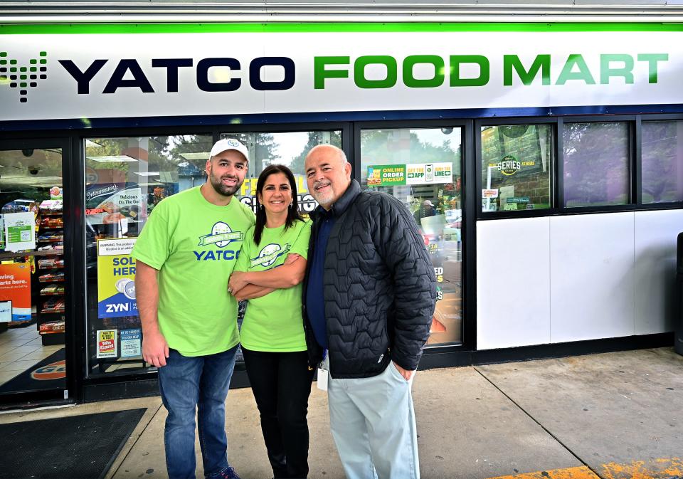 Yatco owners Tarek and Khadijeh Yatim and their son Hussein outside their 446 Lincoln St. location.