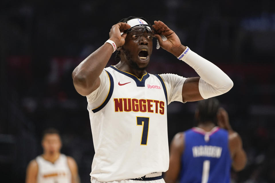 Denver Nuggets guard Reggie Jackson reacts during the first half of an NBA basketball game against the Los Angeles Clippers, Monday, Nov. 27, 2023, in Los Angeles. (AP Photo/Ryan Sun)