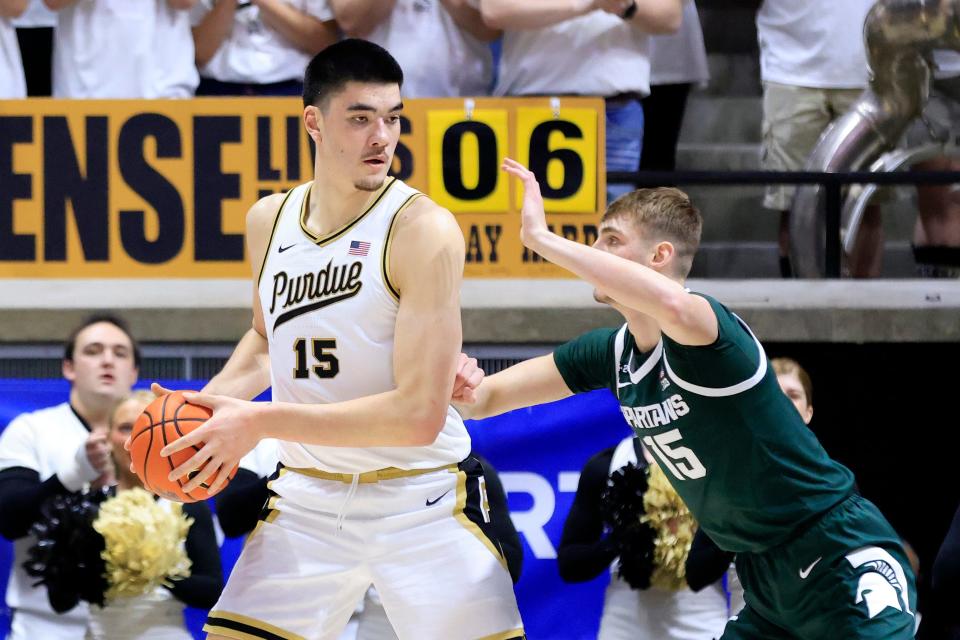 WEST LAFAYETTE, INDIANA - JANUARY 29: Zach Edey #15 of the Purdue Boilermakers makes a move on Carson Cooper #15 of the Michigan State Spartans during the first half at Mackey Arena on January 29, 2023 in West Lafayette, Indiana.