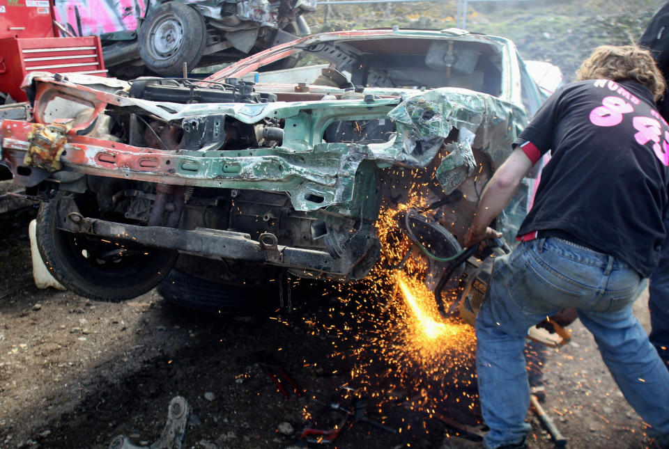 <p>£28,369 annual salary, 48 deaths: Working under cars, vans, trucks and other vehicles is a dangerous occupation. Crush injuries and fatalities are not infrequent (Matt Cardy/Getty Images) </p>