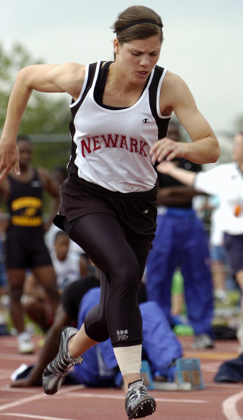 Natalie (Yost) Prescott still holds Newark's school records in the 100 and 200.