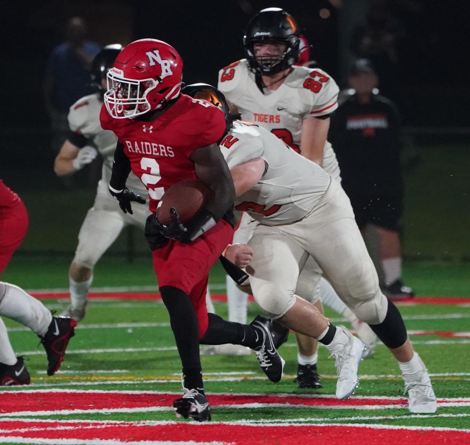 North Rockland's Gamaliel Sauveur (2) with the carry during their 39-23 win over Mamaroneck at the Town of Haverstraw Sports Complex on Friday, September 8, 2023.