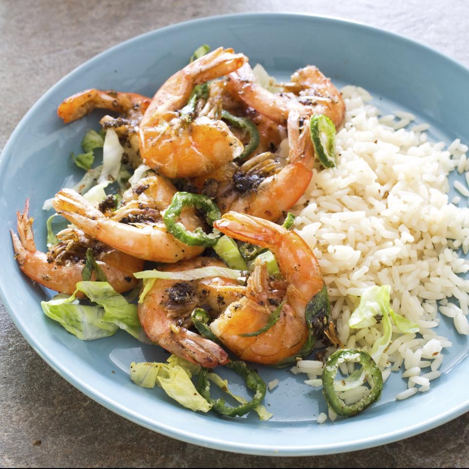 This undated photo provided by America's Test Kitchen in May 2019 shows Crispy Salt and Pepper Shrimp in Brookline, Mass. This recipe appears in the cookbook “Spiced.” (Carl Tremblay/America's Test Kitchen via AP)