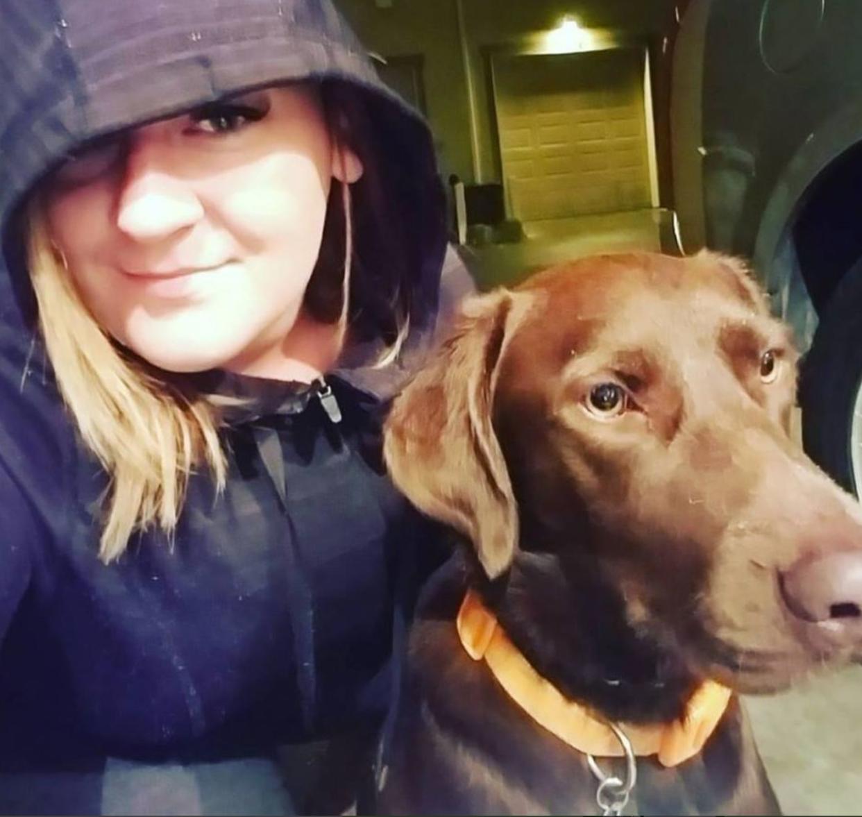 Stephanie Carruthers, who uses the handle Snow, is a "white hat" hacker. Her dog Eros helps her fight crime online. (Photo: Courtesy of Snow)
