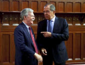 U.S. National Security Adviser John Bolton, left, and Russian Foreign Minister Sergey Lavrov talk to each other during their meeting in Moscow, Russia, Monday, Oct. 22, 2018. U.S. President Donald Trump's national security adviser has met with top Russian officials after Trump declared he intended to pull out of a 1987 nuclear weapons treaty. (Russian Foreign Ministry Press Service via AP)