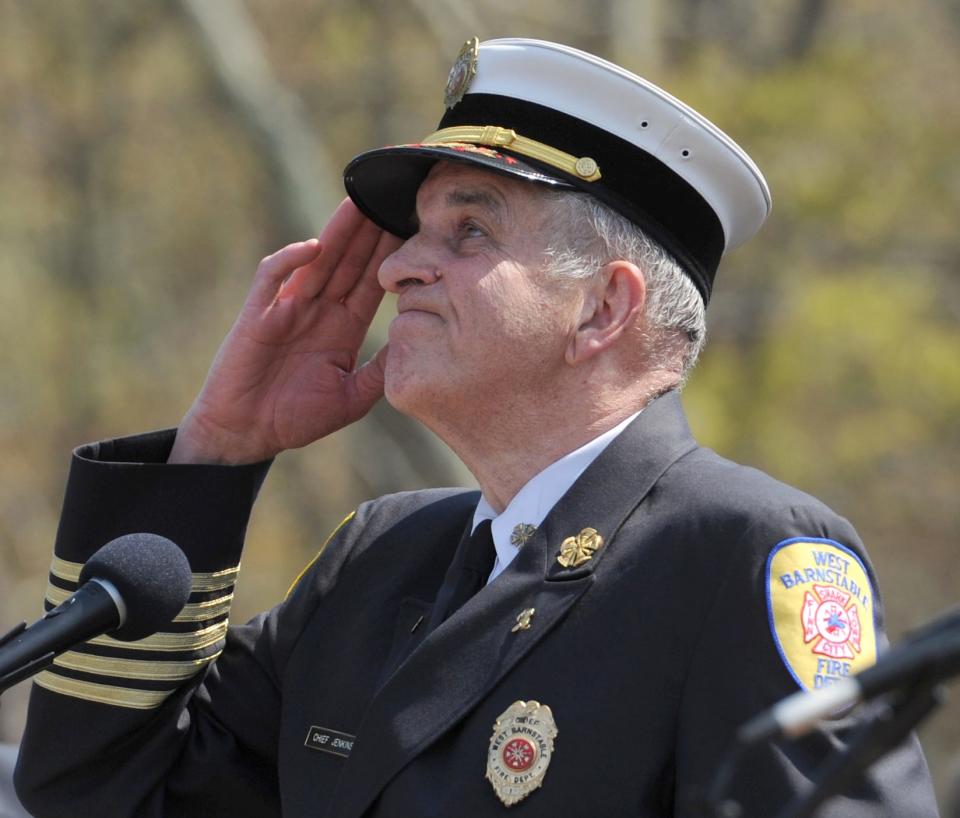 Former West Barnstable Fire Chief John Jenkins died last week at age 77. He served chief for 32 years. Above, Jenkins sang God Bless America at a 2018 dedication for the First Responders Appreciation Overpass at Route 149 on Route 6.