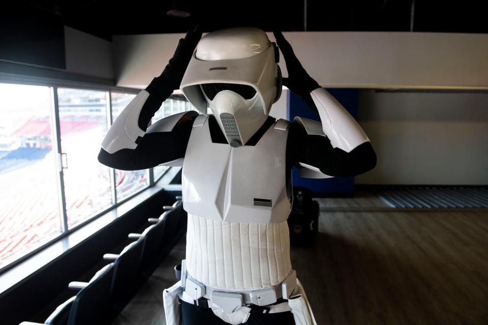 Laryssa Goodlad of Donelson adjusts her Scout Trooper helmet before joining a fundraiser for Our Kids, a nonprofit serving children and families affected by child sexual abuse, at Nissan Stadium in Nashville , Tenn., Sunday, Feb. 19, 2023.