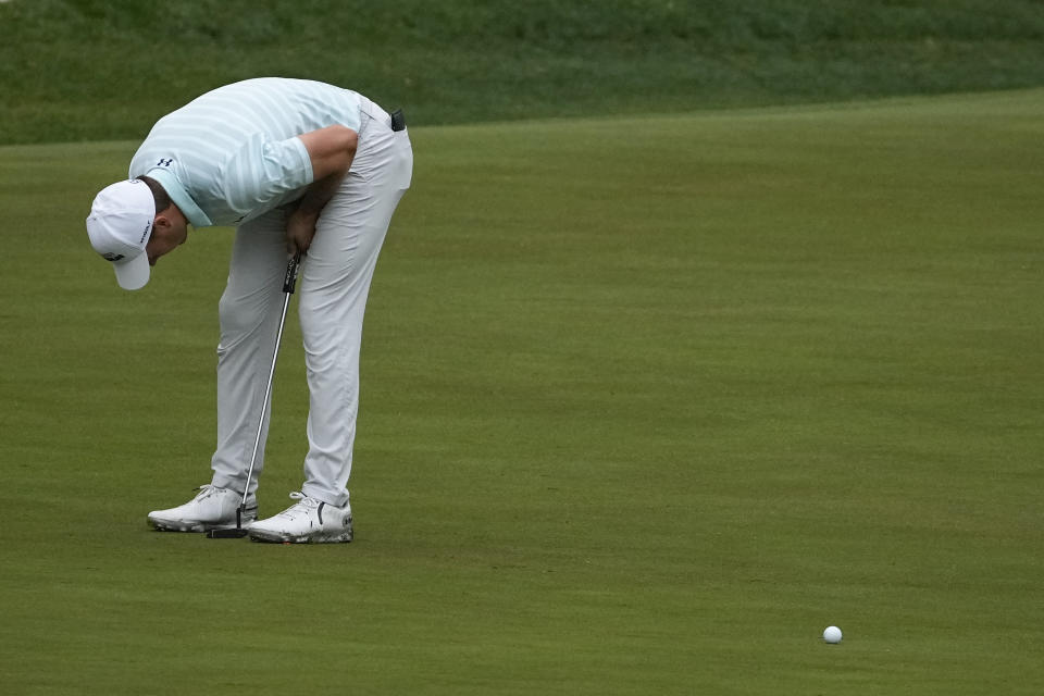 Jordan Spieth reacts to a missed birdie putt on the 13th green during the third round of the Masters golf tournament on Saturday, April 10, 2021, in Augusta, Ga. (AP Photo/Charlie Riedel)