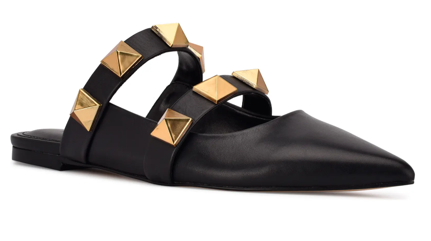 Black mule shoe with gold studs. 