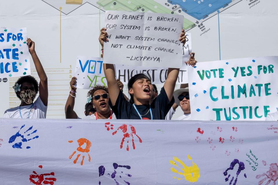 Members of the "Pacific Islands Students Fighting Climate Change" (PISFCC) organization stage a protest during the COP27 United Nations Climate Summit in Sharm el-Sheikh, Egypt, Thursday, Nov. 10, 2022.