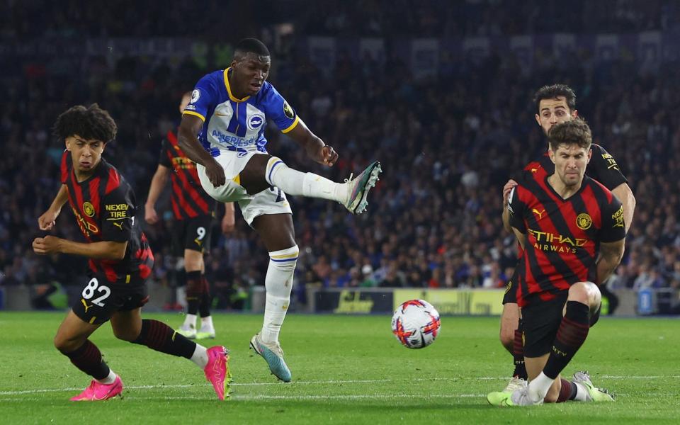 Brighton &  Hove Albion's Moises Caicedo shoots at goal against Man City - Action Images via Reuters/Paul Childs