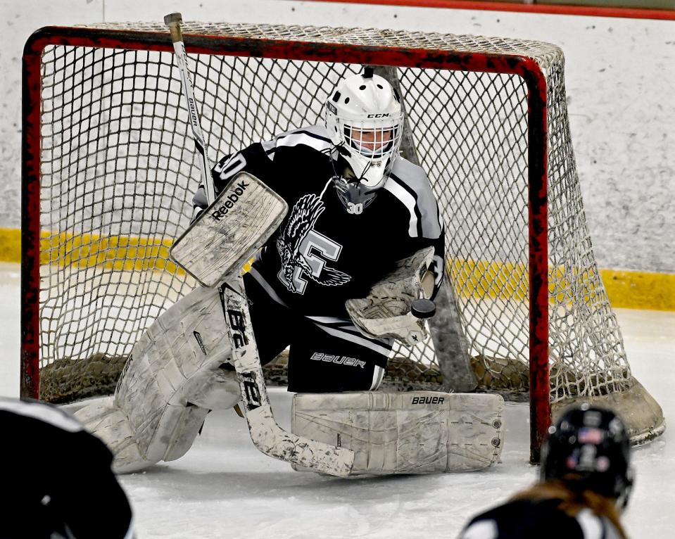 Framingham goalie  Mikal Franklin makes a save during the third period against Hopkinton/Dover-Sherborn at New England Sports Center in Marlborough, Jan. 15, 2021. 