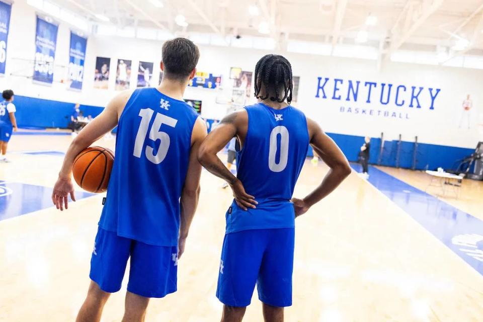 Reed Sheppard, left, and Rob Dillingham stand together during a Kentucky basketball practice.