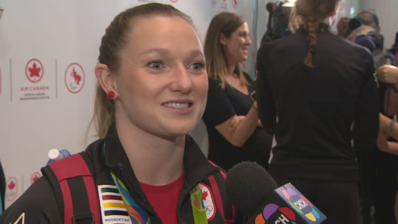 Smiles and choked-up tears: Rosie MacLennan's parents after Rio