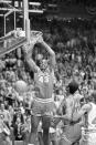 FILE - In this April 4, 1983, file photo, North Carolina State's Lorenzo Charles (43) dunks the ball to give N.C. State a 54-52 win over Houston in the NCAA Final Four college basketball championship game in Albuquerque, N.M. The airball-turned-buzzer-beating dunk stunned top-ranked Houston. (AP Photo/File)