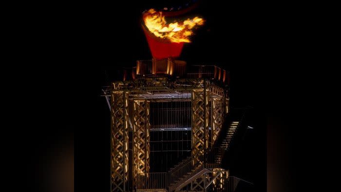 19 Jul 1996:  The Olympic Flame burns above the Olympic Stadium during the Opening Ceremony of the 1996 Olympic Games in Atlanta, Georgia.