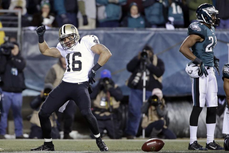 New Orleans Saints' Lance Moore (16) celebrates after scoring a touchdown during the second half of an NFL wild-card playoff football game against the Philadelphia Eagles, Saturday, Jan. 4, 2014, in Philadelphia. (AP Photo/Matt Rourke)