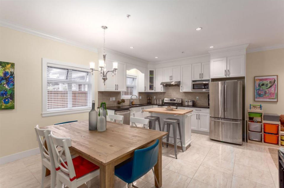 <p><span>5512 Dundee St., Vancouver, B.C.</span><br> This 1,336-square-foot home, built less than a year ago, has stainless steel appliances in the kitchen and granite countertops.<br> (Photo: Zoocasa) </p>