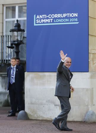 The President of Afghanistan Ashraf Ghani waves as he arrives at a summit on corruption at Lancaster House in central London, Britain, May 12, 2016. REUTERS/Paul Hackett