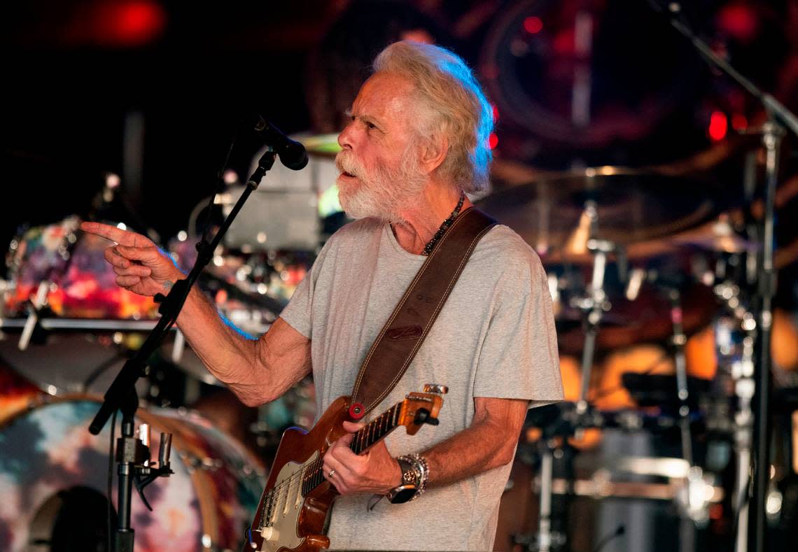 Bob Weir, one of the original members of Grateful Dead gestures to the crowd as Dead & Company perform on their final tour at Raleigh, N.C.’s Coastal Credit Union Music Park at Walnut Creek, Thursday night, June 1, 2023.