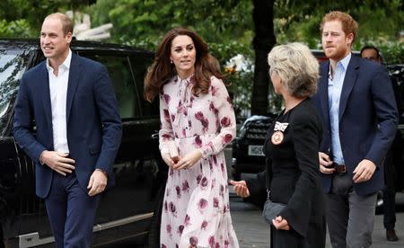 Britain's Prince William, his wife Catherine, Duchess of Cambridge, and Prince Harry, arrive for a Heads Together event to celebrate World Mental Health Day at County Hall in London, Britain October 10, 2016. REUTERS/Stefan Wermuth