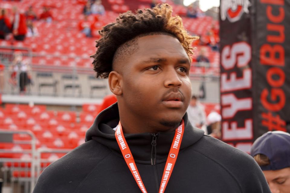 Buford High School (Buford, Georgia) defensive lineman Eddrick Houston takes in Ohio State's pregame ahead of the Buckeyes' kickoff against Maryland in October.