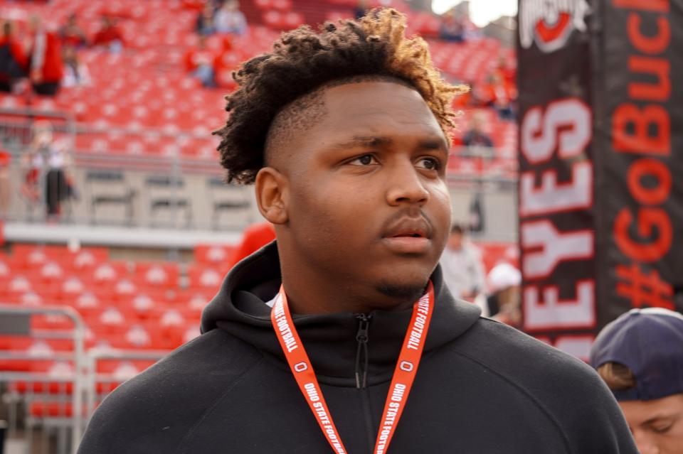 Buford High School (Buford, Georgia) defensive lineman Eddrick Houston takes in Ohio State's pregame ahead of the Buckeyes' kickoff against Maryland at Ohio Stadium on Oct. 7, 2023.