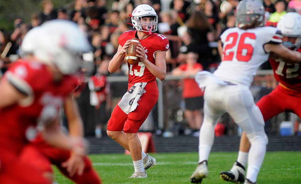 Loudonville High School's Matt Sprang (13) looks downfield during football action between Centerburg and Loudonville at Redbird Stadium  Friday September 16,2022  Steve Stokes/for Ashland Times-Gazette