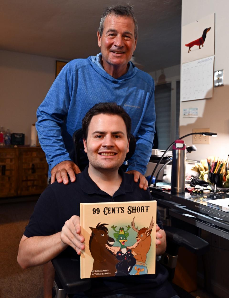 Liam Campbell, diagnosed on the autism spectrum, communicated by drawing until he started talking at 8. Liam's dad, Tom, standing, said he knew his son could draw when at age 3 he sketched a sign on a ferry. The two have now published a book illustrated by Liam.