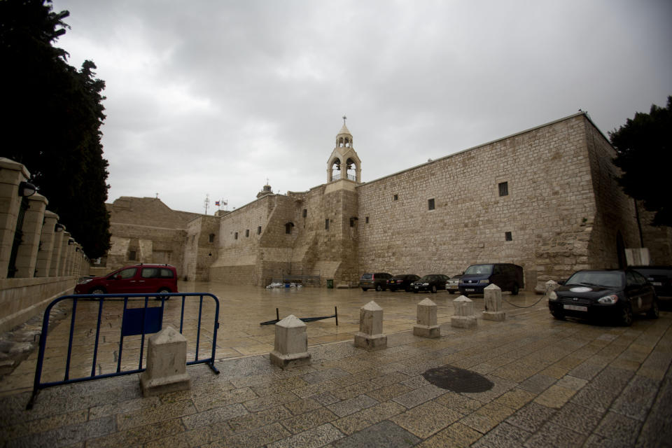 The Church of the Nativity that was closed as a preventive measure against the coronavirus is seen in Bethlehem, West Bank, Friday, March 6, 2020. The Palestinian tourism ministry said it's closing the storied Church of the Nativity, the traditional birthplace of Jesus, as a precaution.(AP Photo/Majdi Mohammed)