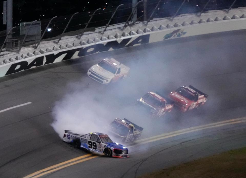 Ben Rhodes (99) crashes with just over 25 laps to go in the Fresh From Florida 250 on Friday, Feb. 16, 2024 at Daytona International Speedway.