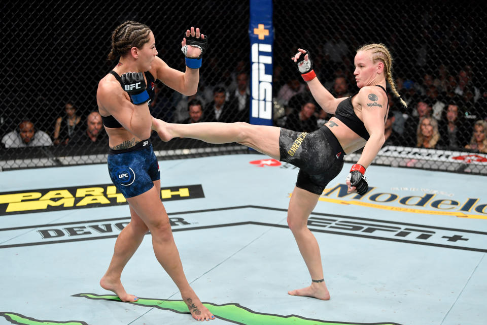 CHICAGO, IL - JUNE 08:  (R-L) Valentina Shevchenko of Kyrgyzstan kicks Jessica Eye in their women's flyweight championship bout during the UFC 238 event at the United Center on June 8, 2019 in Chicago, Illinois. (Photo by Jeff Bottari/Zuffa LLC/Zuffa LLC via Getty Images)