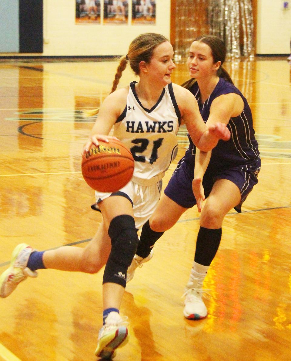Prairie Central's Mariya Sisco drives to the basket against EL Paso-Gridley Thursday. Sisco had 12 points and 8 rebounds in the Hawks' 60-35 win.