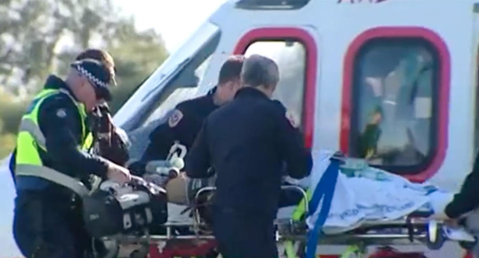 Emergency services took an hour to cut the man free then stabilise him before air-lifting him to hospital. Source: 7 News