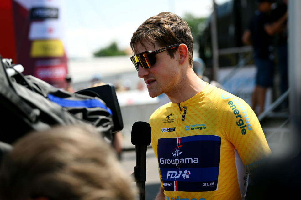 TAFERS SWITZERLAND  JUNE 13 Stefan Kng of Switzerland and Team GroupamaFDJ  Yellow leader jersey attends to the media press prior to the 86th Tour de Suisse 2023 Stage 3 a 1438km stage from Tafers to VillarssurOllon 1256m  UCIWT   on June 13 2023 in Tafers Switzerland Photo by Dario BelingheriGetty Images