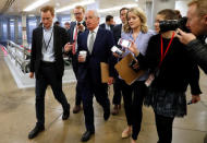 Reporters trail U.S. Senator Bob Corker (R-TN) as he arrives ahead of a vote on a bill to renew the National Security Agency's warrantless internet surveillance program, at the U.S. Capitol in Washington, U.S. January 18, 2018. REUTERS/Jonathan Ernst