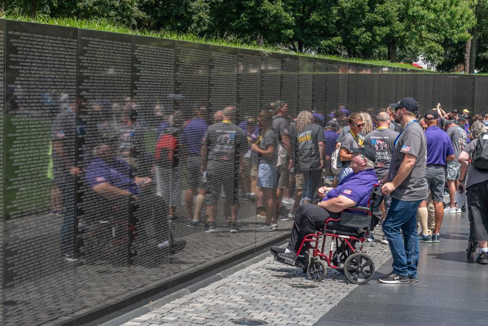 Veterans visit the Vietnam War Memorial in Washington, D.C., on Aug. 7, 2023, Purple Heart Day. Each of the veterans on the Honor Flight were recipients of Purple Hearts.