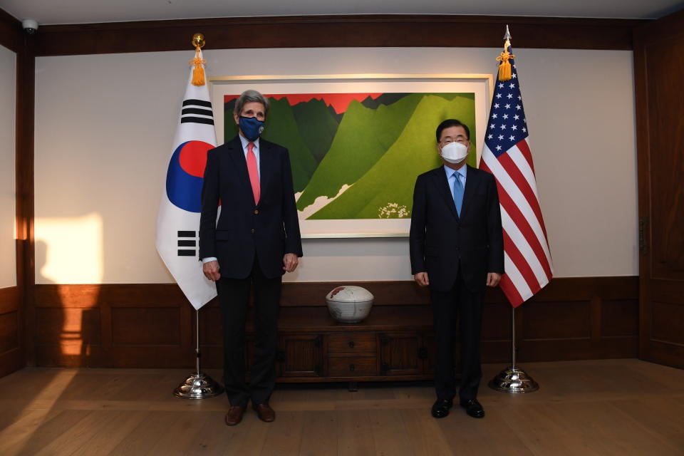 In this photo provided by U.S. Embassy Seoul, U.S. Special Presidential Envoy for Climate John Kerry, left, and South Korean Foreign Minister Chung Eui-yong, right, pose for photograph at the Foreign Minister's residence in Seoul, South Korea, Saturday, April 17, 2021. (U.S. Embassy Seoul via AP)