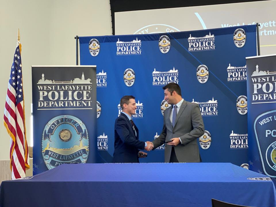 West Lafayette Police officers Michael Lucas (left) and Anthony Burkhart (right) at their officer swearing-in ceremony. Nov. 30, 2021.