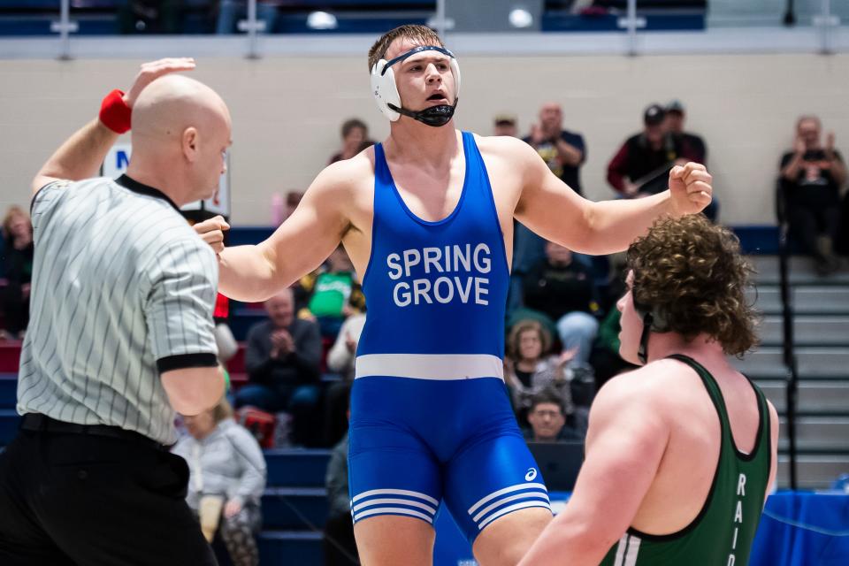 Spring Grove's Michael Hershey reacts after defeating Twin Valley's Ean Winchester in the heavyweight championship bout at the PIAA District 3 Class 3A Wrestling Championships at Spring Grove Area High School on Saturday, Feb. 24, 2024, in Jackson Township. Hershey won by decision, 3-2, in T2.