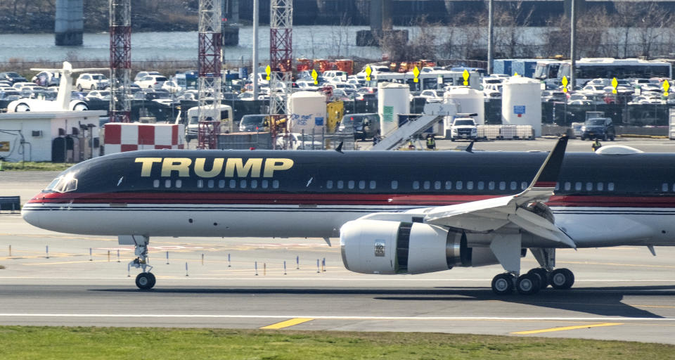 CORRECTS TO 2023, NOT 3023 - An aircraft carrying former President Donald Trump arrives at LaGuardia Airport in New York Monday, April 3, 2023. (AP Photo/Craig Ruttle)