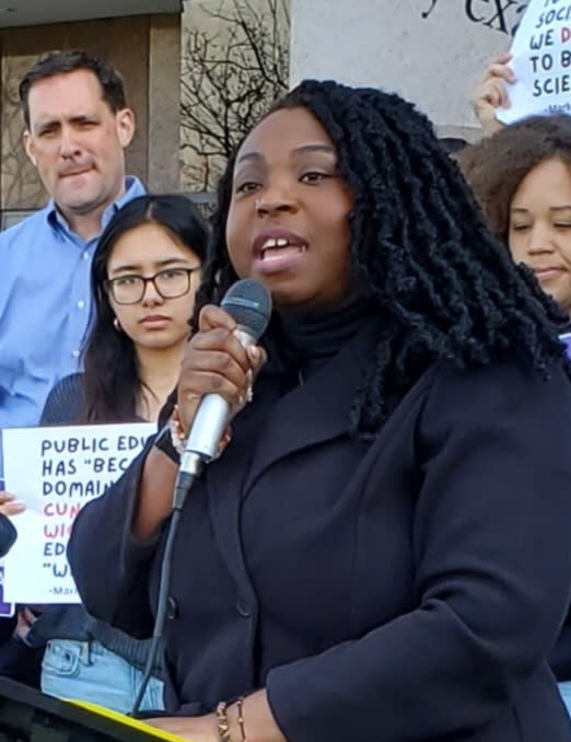 Tamika Walker Kelly speaks at a rallly