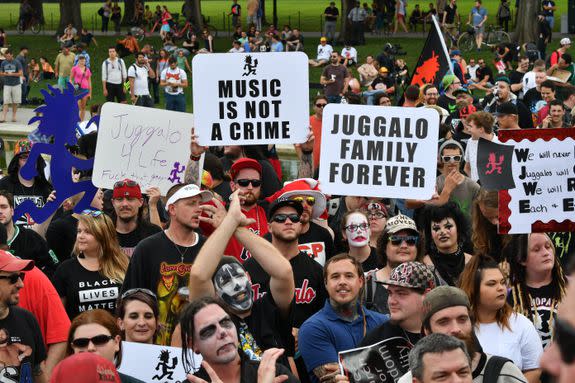 Fans of the US rap group Insane Clown Posse, known as Juggalos, assemble on September 16, 2017 near the Lincoln Memorial in Washington, D.C. to protest at a 2011 FBI decision to classify their movement as a gang. / AFP PHOTO / PAUL J. RICHARDS        (Photo credit should read PAUL J. RICHARDS/AFP/Getty Images)