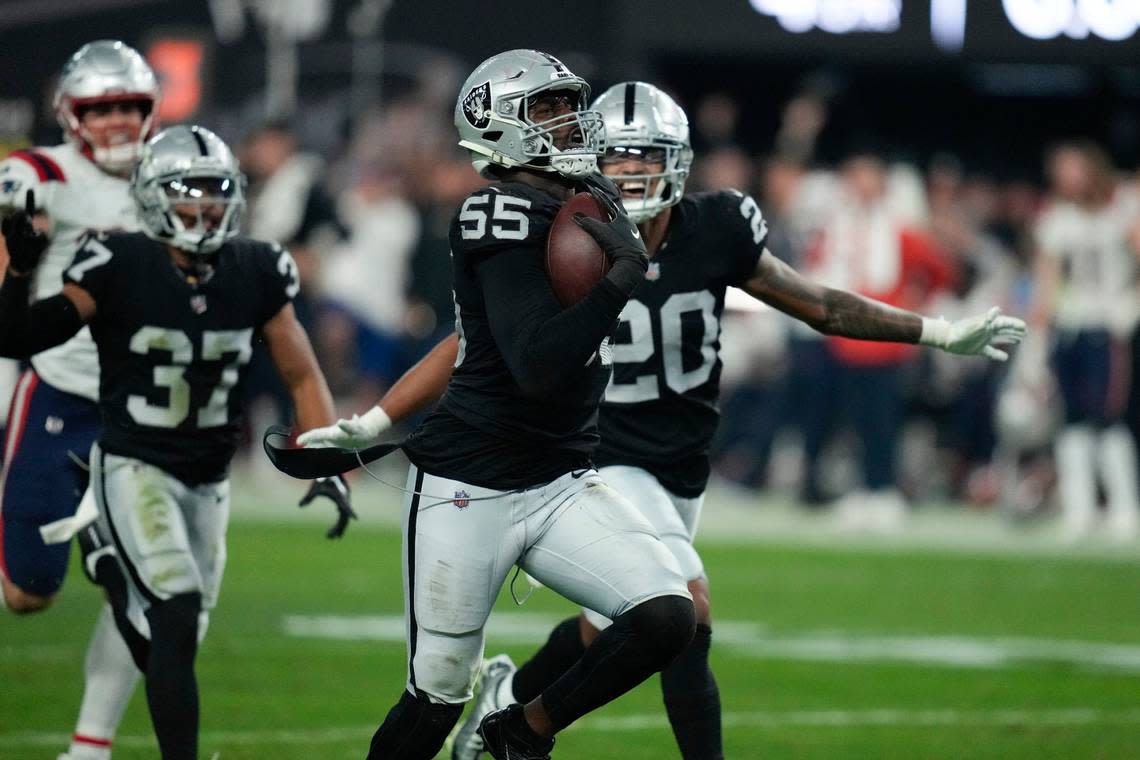 Las Vegas Raiders defensive end Chandler Jones runs into the end zone to score on an interception during the second half of an NFL game between the New England Patriots and Las Vegas Raiders, Sunday, Dec. 18, 2022, in Las Vegas. The Raiders defeated the Patriots 30-24.