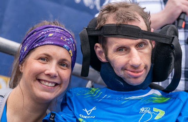 headshots of Rob Burrow and his wife Lindsey